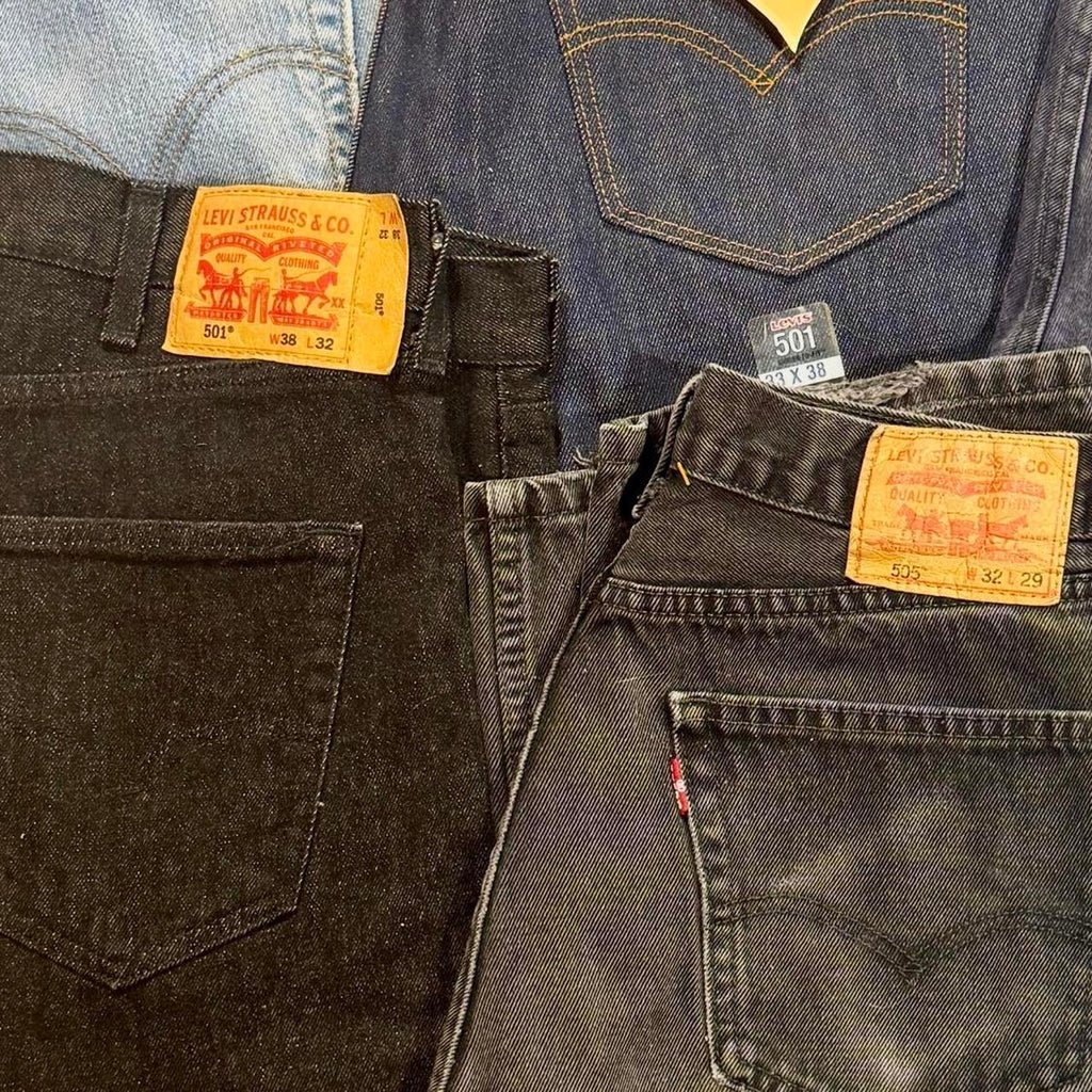 Levi’s bulk denim lot featuring 28 pairs in a variety of popular fits, washes, and sizes.