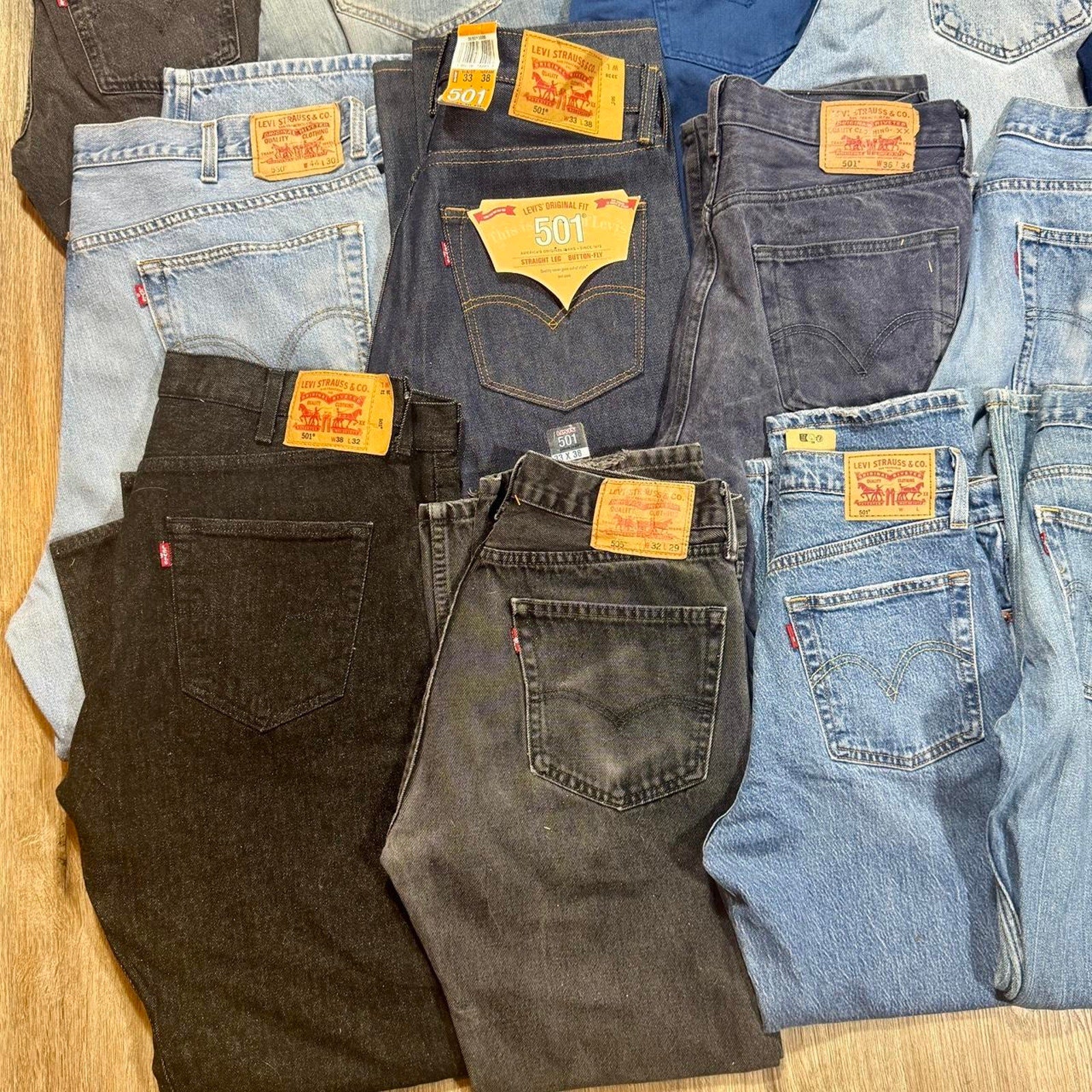 Levi’s bulk denim lot featuring 28 pairs in a variety of popular fits, washes, and sizes.