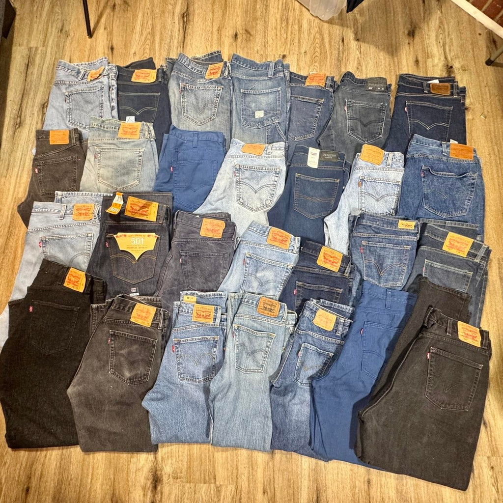 Levi’s bulk denim lot featuring 28 pairs in a variety of popular fits, washes, and sizes.